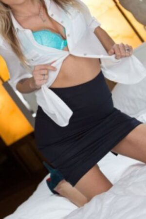 Amy Blonde MILF Glasgow Escort showing her bra