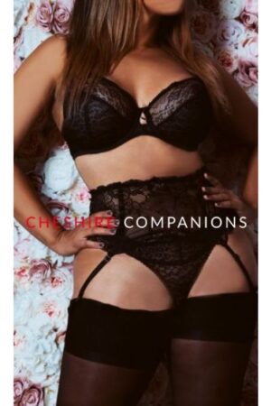 Carmen Experienced Busty Manchester Escort in black lingerie