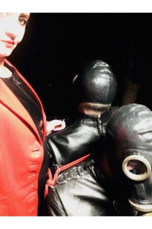 Lady Amber with a gimp in leather