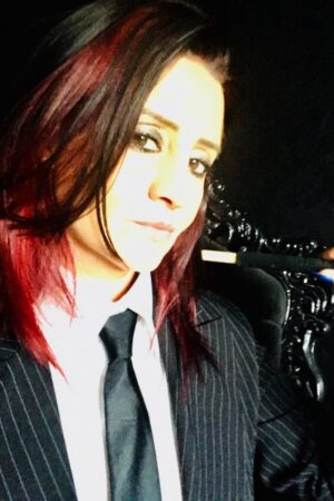 Lady Amber in a suit