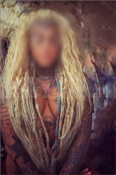 Heavily tattooed Alesha London Escort with dreads