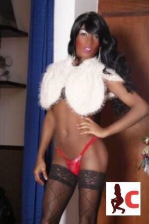 TS Escort Candela in fur and red thong
