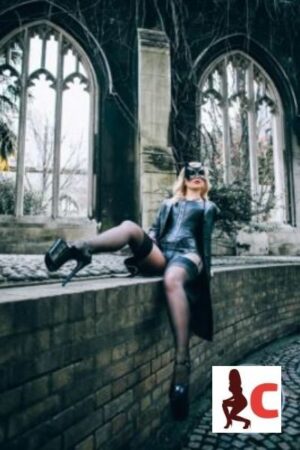 Alexandra Wildfire in bondage gear in a church