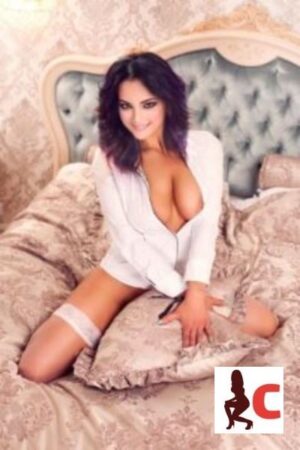 Jenny Brunette Carlow Escort in seductive white blouse