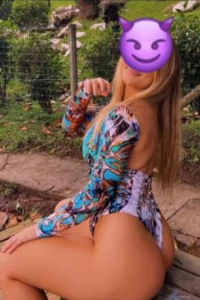 Diana Independent Greenwich Escort wearing a funky bathing suit