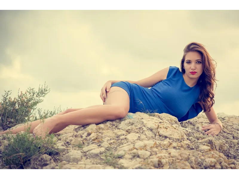 Romford escort in a blue dress