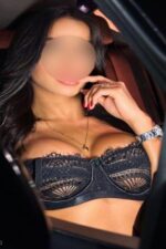 Indian Escort in a black bra