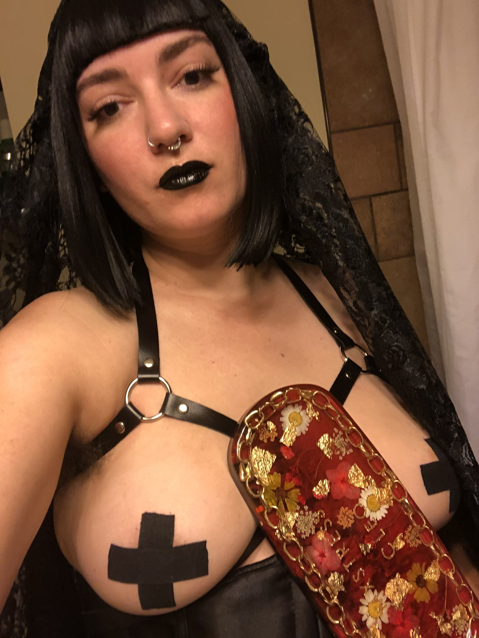 Dom in leather outfit