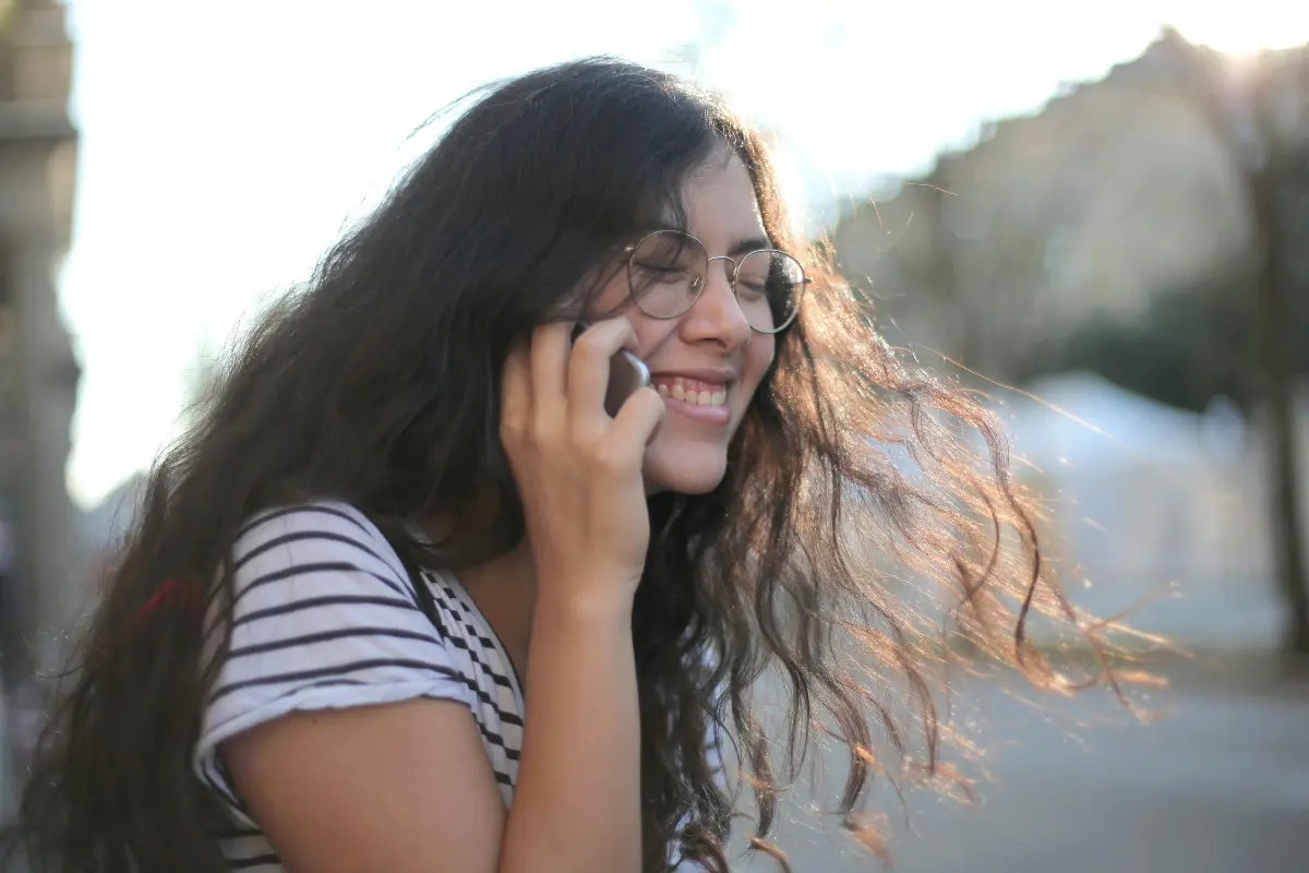 Smiling woman on the phone