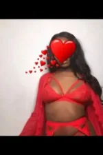 Ebony escort in red lingerie
