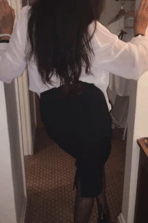 Mature escort in evening attire