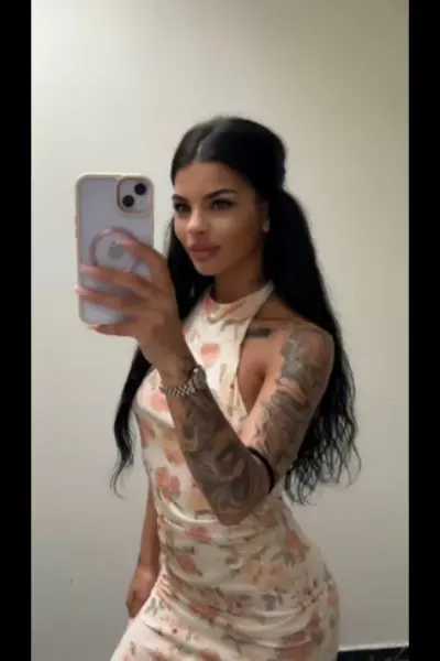 Tattooed Inverness escort taking a selfie