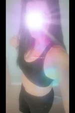 Mature Newcastle escort in black gymwear