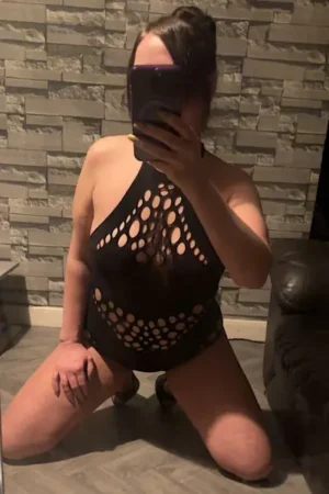 Birmingham Escort in black underwear taking a selfie