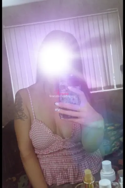 Brunette Newcastle escort taking a selfie