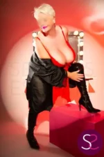 Super busty GG Manchester escort in red lingerie