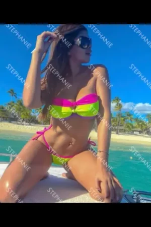 Brunette Dublin escort in a bright bikini