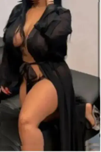 Busty Spanish Escort in black lingerie
