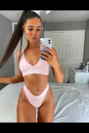 Brunette Swindon Escort in pink underwear