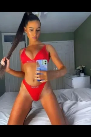 Brunette Swindon Escort in floral underwear in red underwear