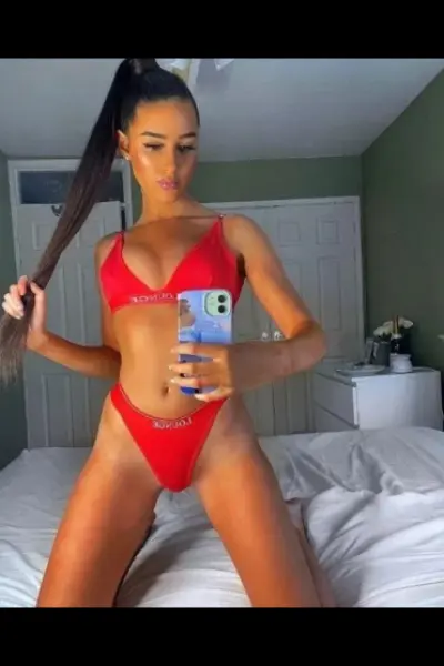 Brunette Swindon Escort in floral underwear in red underwear