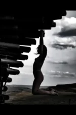 Escort hanging on pipes