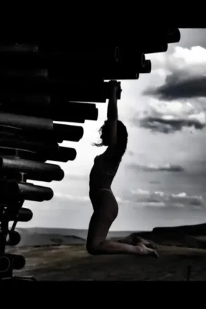 Escort hanging on pipes