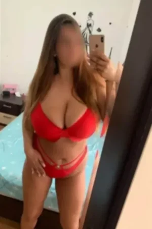 Busty Binley Escort wearing a red bikini