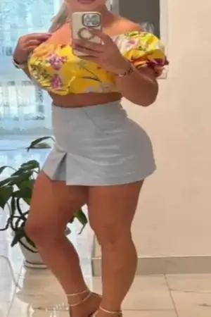 Swedish Escort wearing a floral top