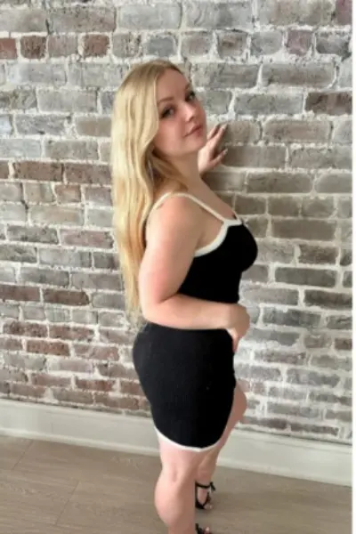 Braunstone Escort in a black dress