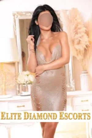British Escort in a beige shimmery dress