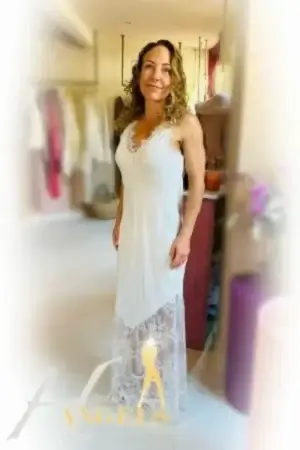 Bournemouth escort in a white dress