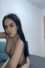 Young sexy escort posing