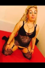 Mature Leeds Escort in black lingerie