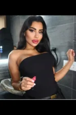 Liverpool Escort posing in a hotel toilet
