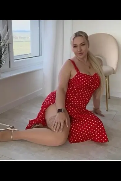 Bristol City Centre Escort in red polka dot dress