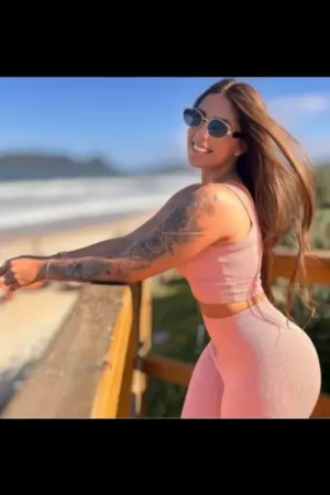 Brunette Bangor escort posing near the sea