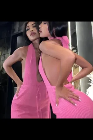 Thai escort wearing a pink dress
