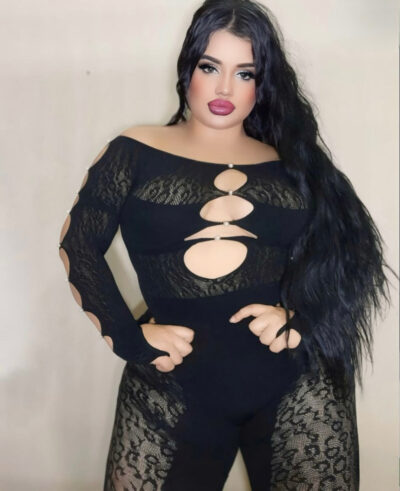 Curvy Ilford Escort in a black outfit