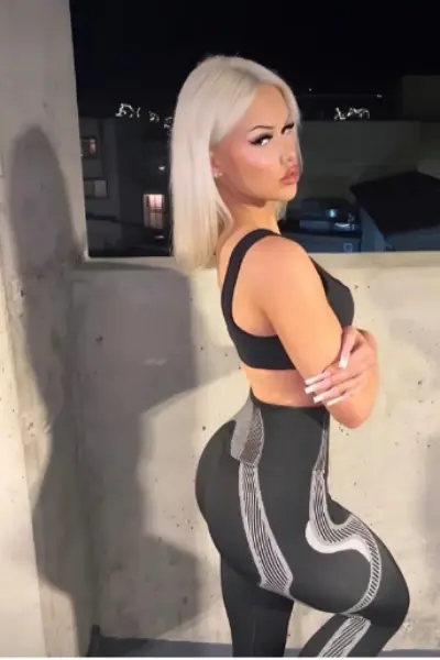 Blonde Moray Escort in tight gym gear