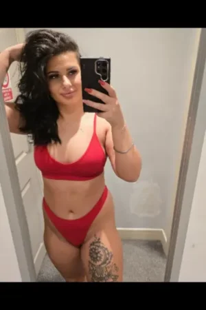 Tattooed Moray Escort in red underwear