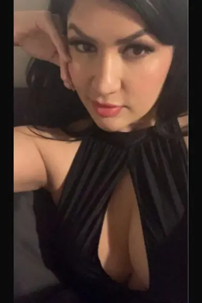 Ukrainian Escort wearing a black dress