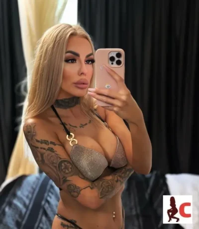 Tattooed Carrickmacross Escort taking a selfie