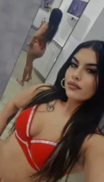 Latina Escort wearing a red bikini
