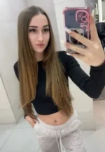 Young brunette Cardiff escort taking a selfie