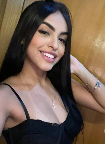 Gorgeous Brazilian escort with white teeth