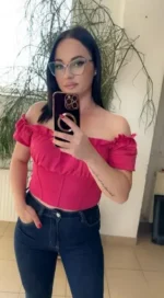 Cardiff escort wearing glasses taking a selfie