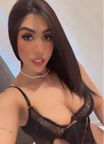 Brunette Wolves escort wearing revealing lingerie