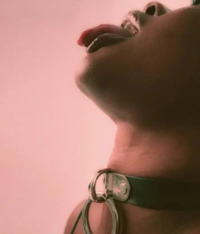 Bondage girl with her tongue out
