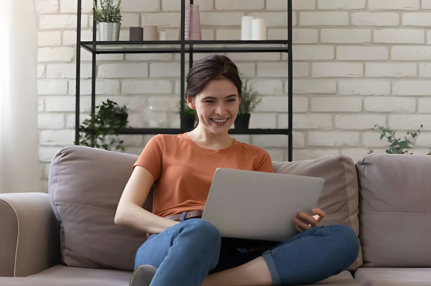 Woman surfing the internet on her laptop